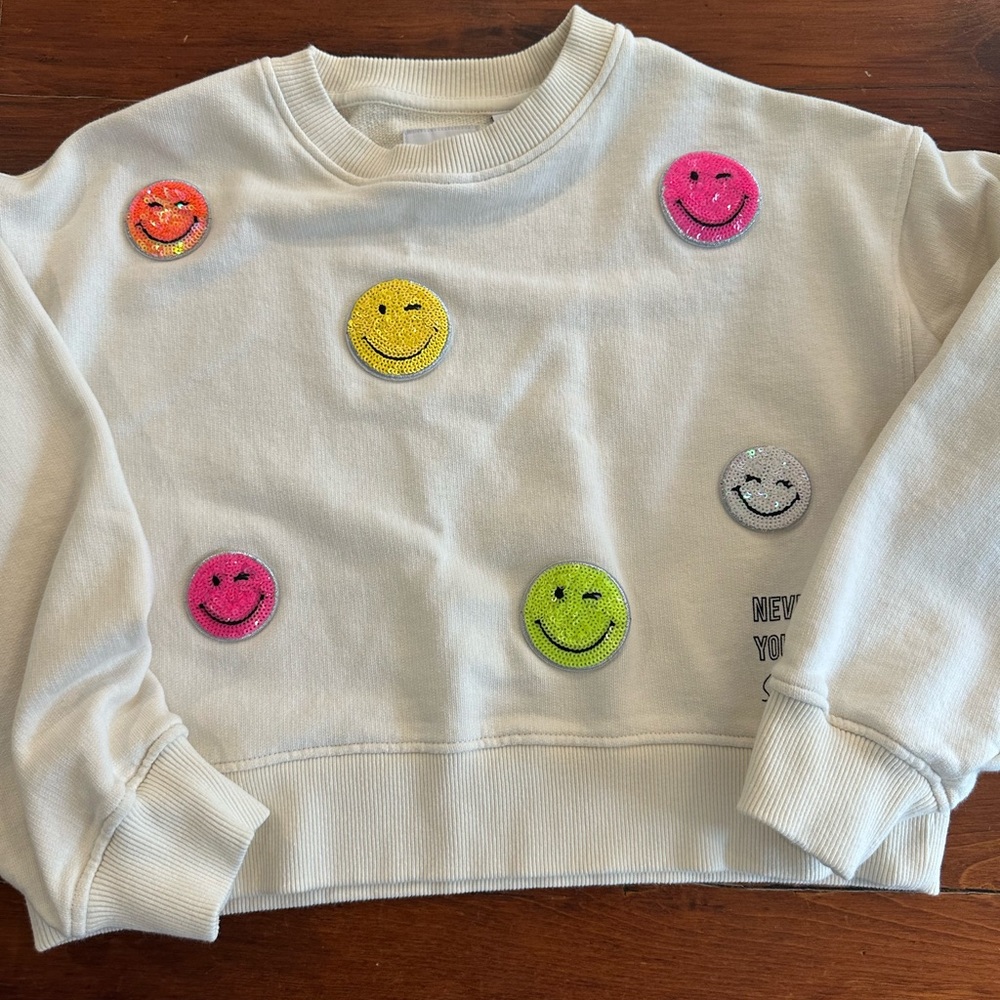 White Sweatshirt with Colorful Smiley Patches from Zara